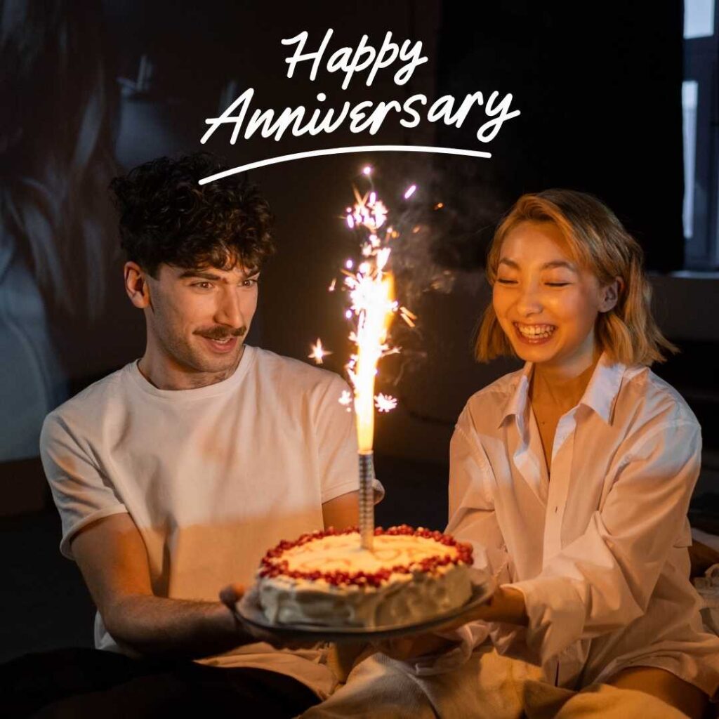 Happy-Anniversary-A-couple-celebrating-Anniversary-with-delicious-cake-and-enjoying-alot