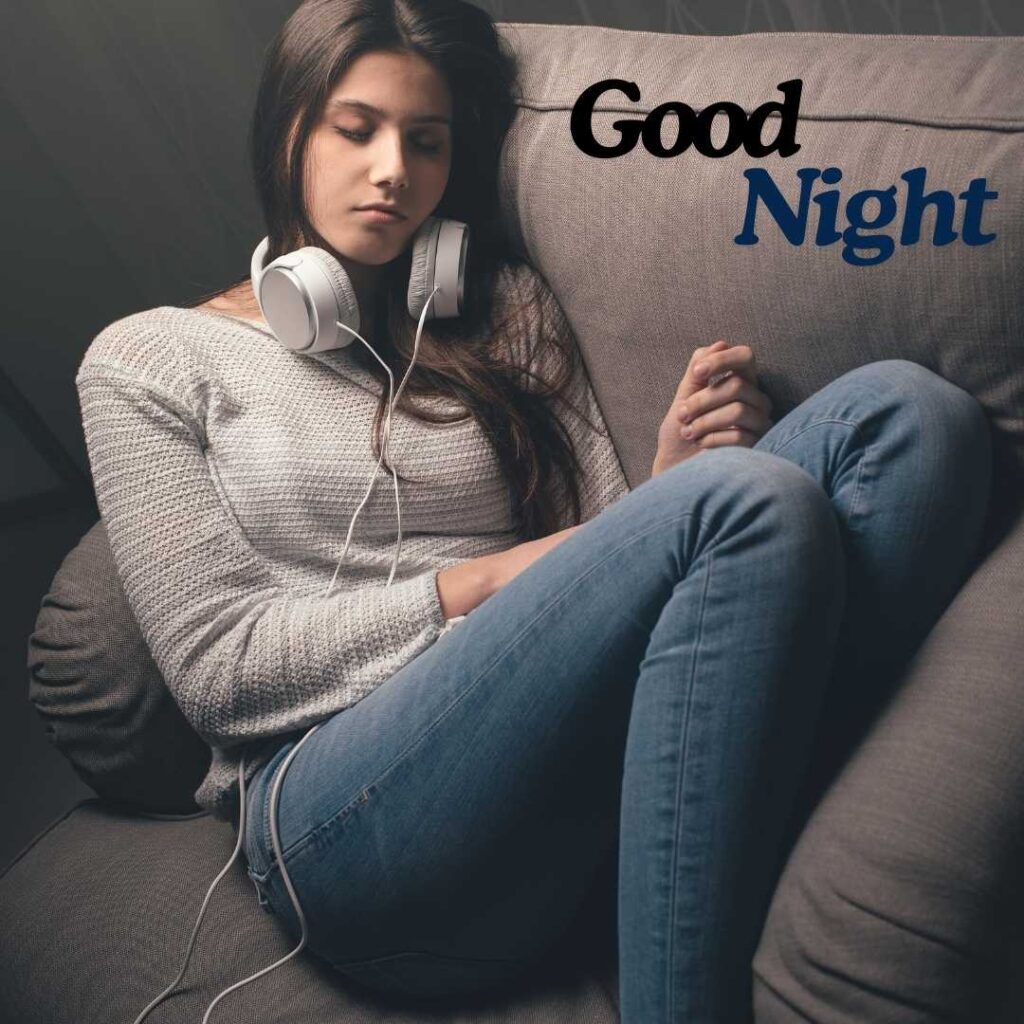 Good-Night-A-girl-in-a-white-sweater-and-blue-jeans-is-sleeping-with-her-head-phones