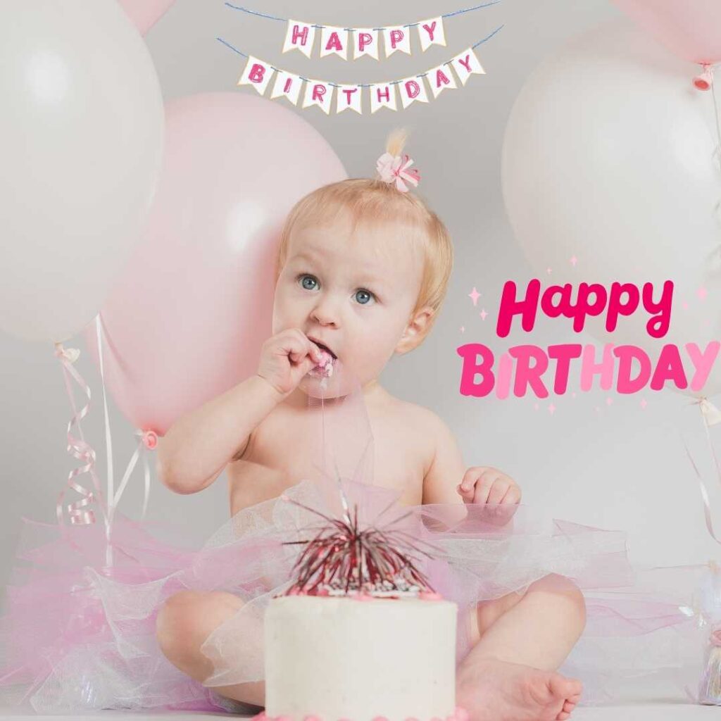Happy-Birthday-A-baby-birthday-girl-sitting-in-front-of-a-birthday-cake