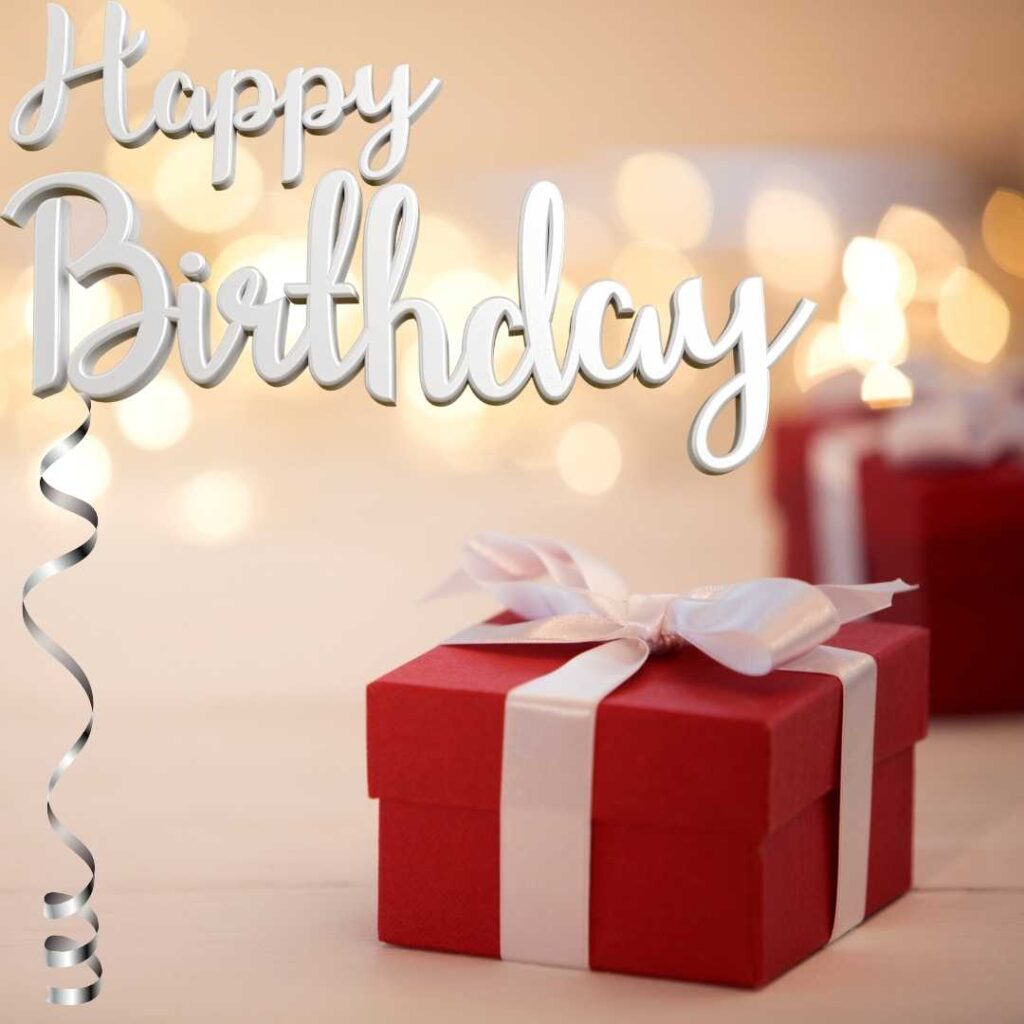 Happy-Birthday-A-beautiful-red-gift-tied-with-a-white-ribbon-conveys-a-happy-birthday-wish