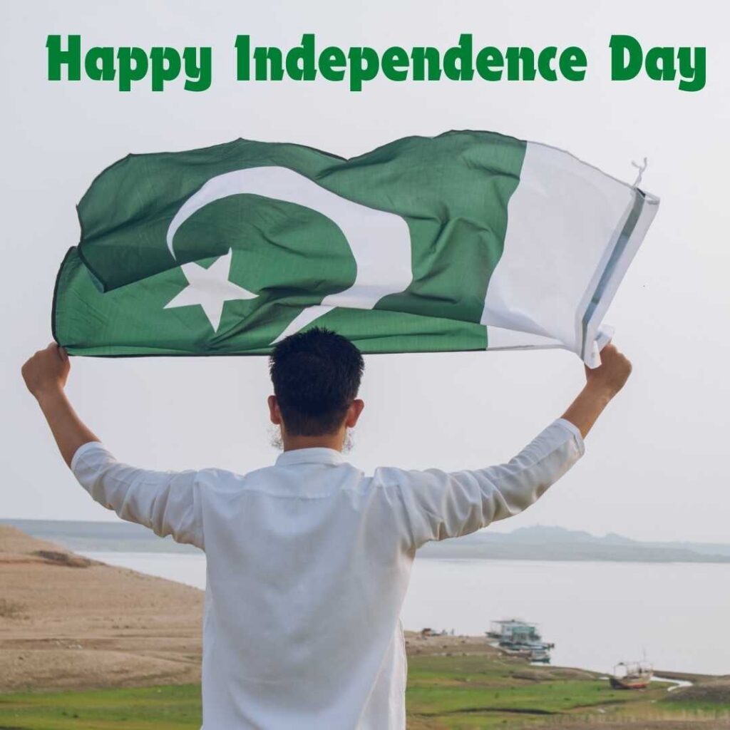 Happy-Independence-Day-A-young-man-holding-a Pakistani-Flag-describe-the-unity-of-Pakistan